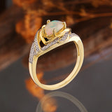 ‘Paisley’ Pear Opal Swirl Halo Set – ring side view