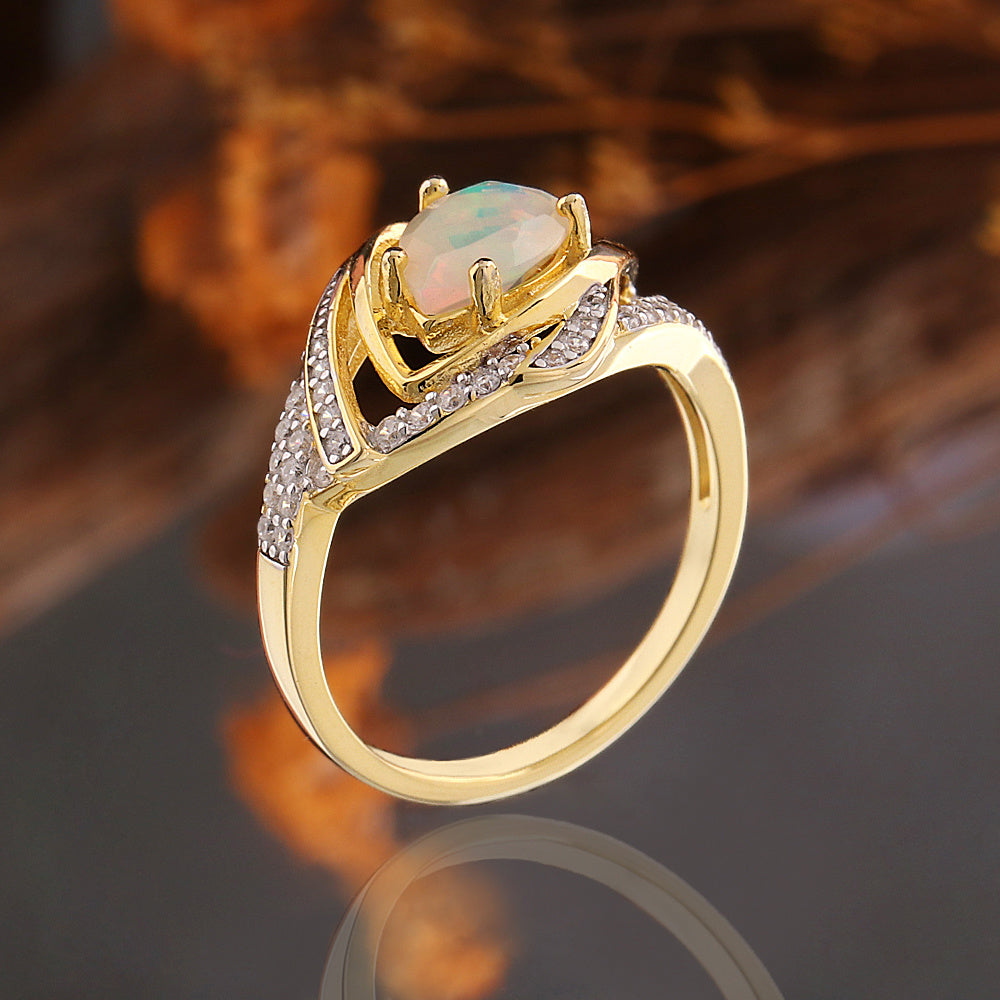 ‘Paisley’ Pear Opal Swirl Halo Set – ring side view