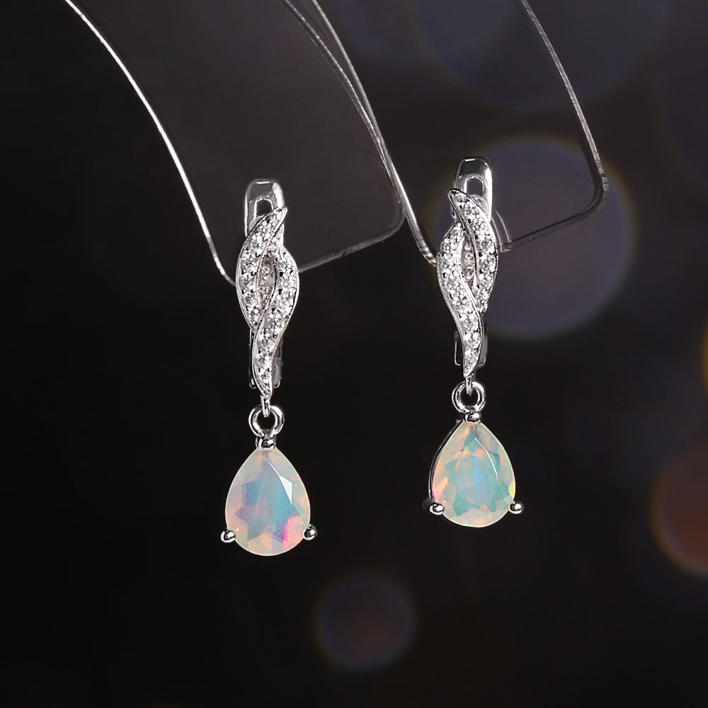 ‘Palmer’ Pear Opal Twist Drop Earrings – on display stand