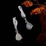 ‘Palmer’ Pear Opal Twist Drop Earrings – front and side