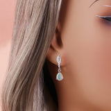 ‘Palmer’ Pear Opal Twist Drop Earrings – on ear