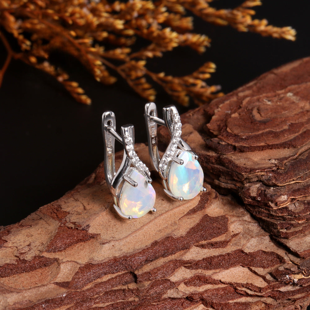 ‘Marnie’ Pear Opal Twist Leverback Earrings – on wood