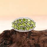 ‘Clovelly’ Peridot Cluster Dome Ring – on driftwood front