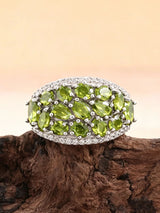 ‘Clovelly’ Peridot Cluster Dome Ring – on driftwood front