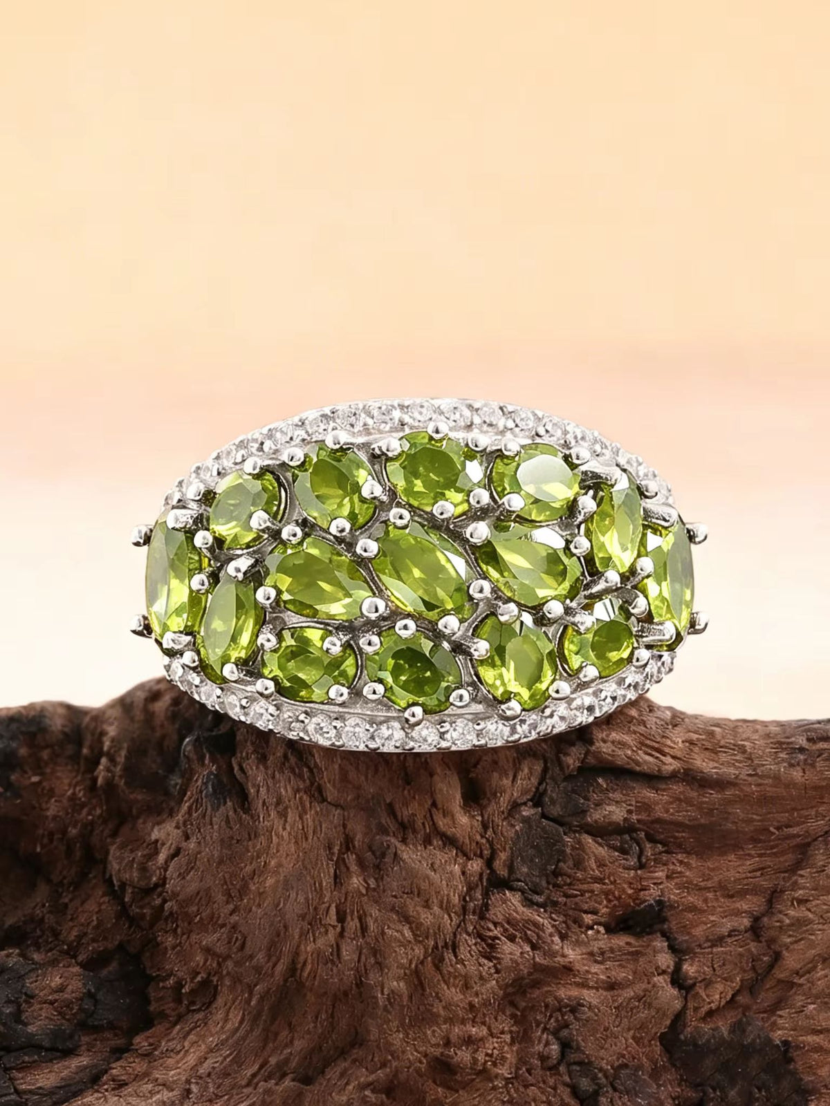 ‘Clovelly’ Peridot Cluster Dome Ring – on driftwood front