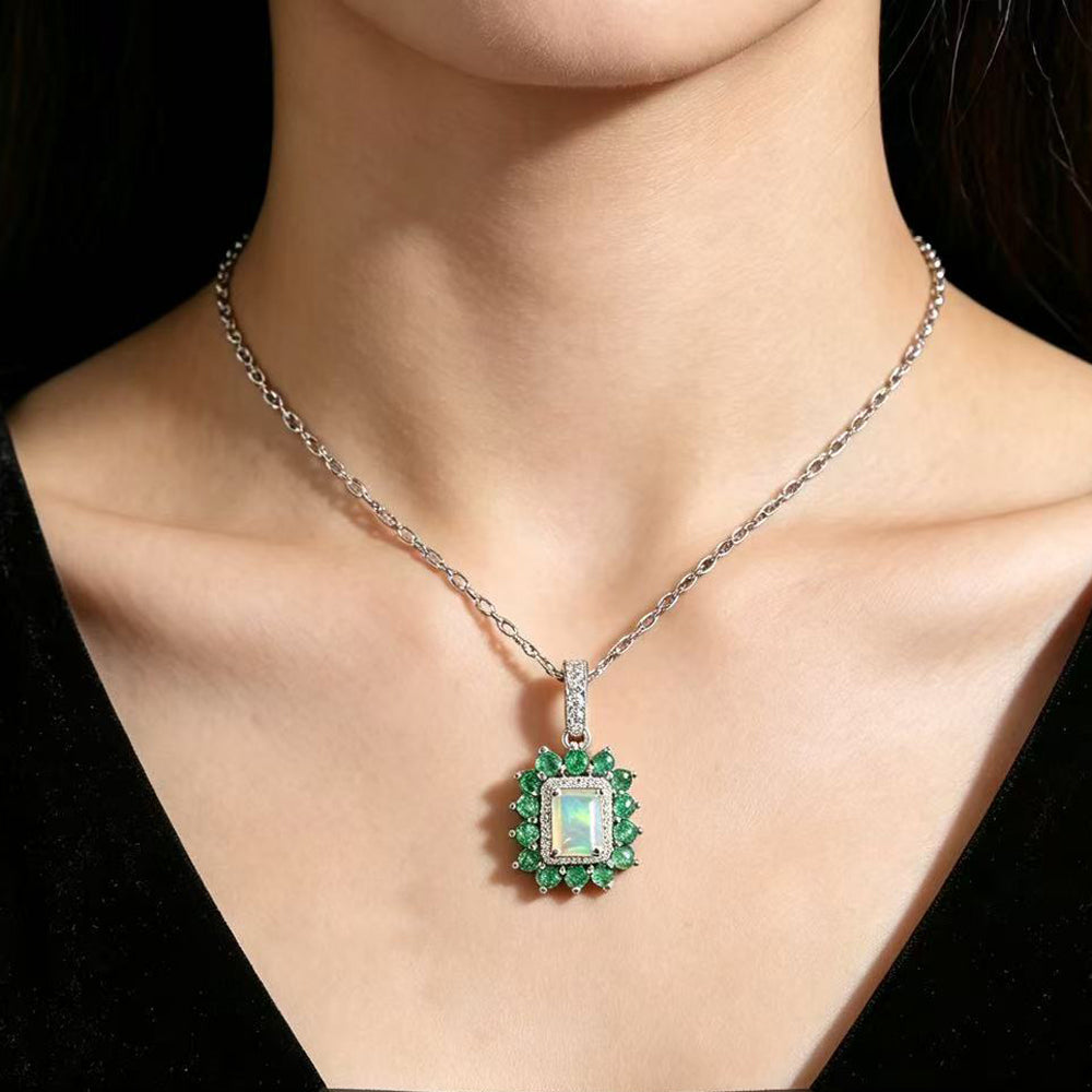 ‘Charlie’ Rectangle Opal Emerald Halo Pendant – on neck