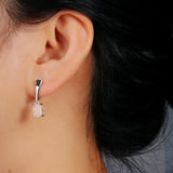 ‘Piper’ Rectangle Opal Tapered Bar Earrings – on ear