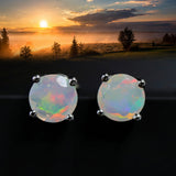 ‘May’ Round Faceted Opal Stud Earrings – sunset backdrop
