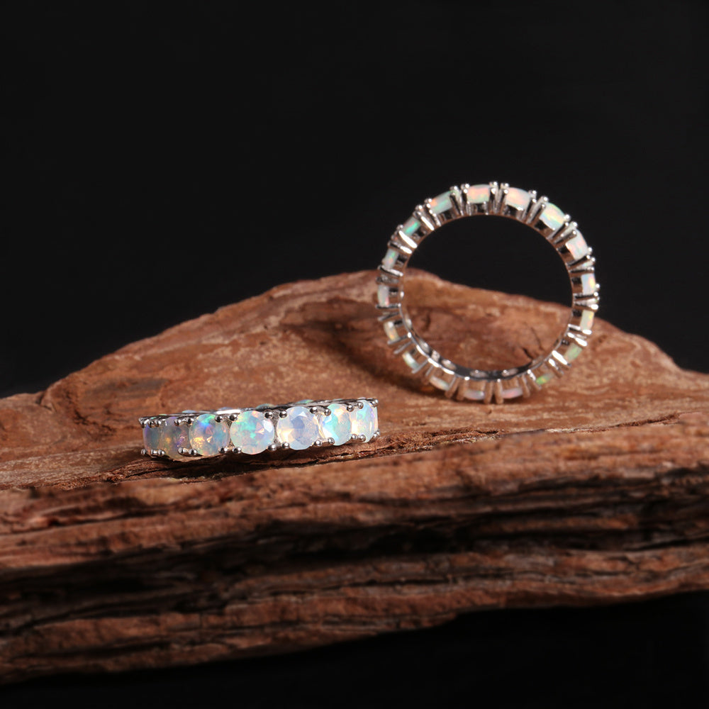 ‘June’ Round Opal Eternity Band Ring – on wood