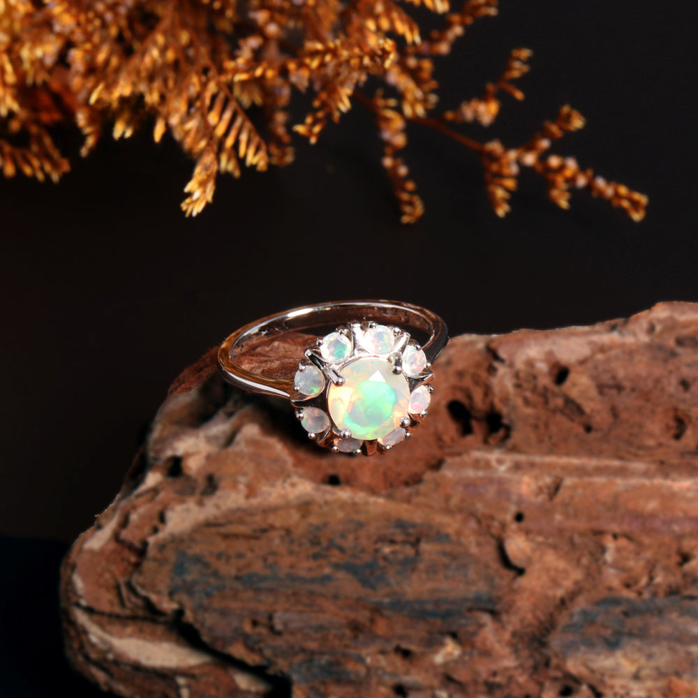‘Camellia’ Round Opal Flower Cluster Ring – on wood