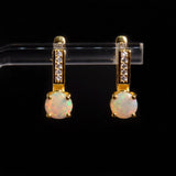 ‘Mesa’ Round Opal Pave Bar Earrings – hanging on stand
