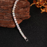 ‘Florence’ Round Opal Tennis Bracelet – draped on wood