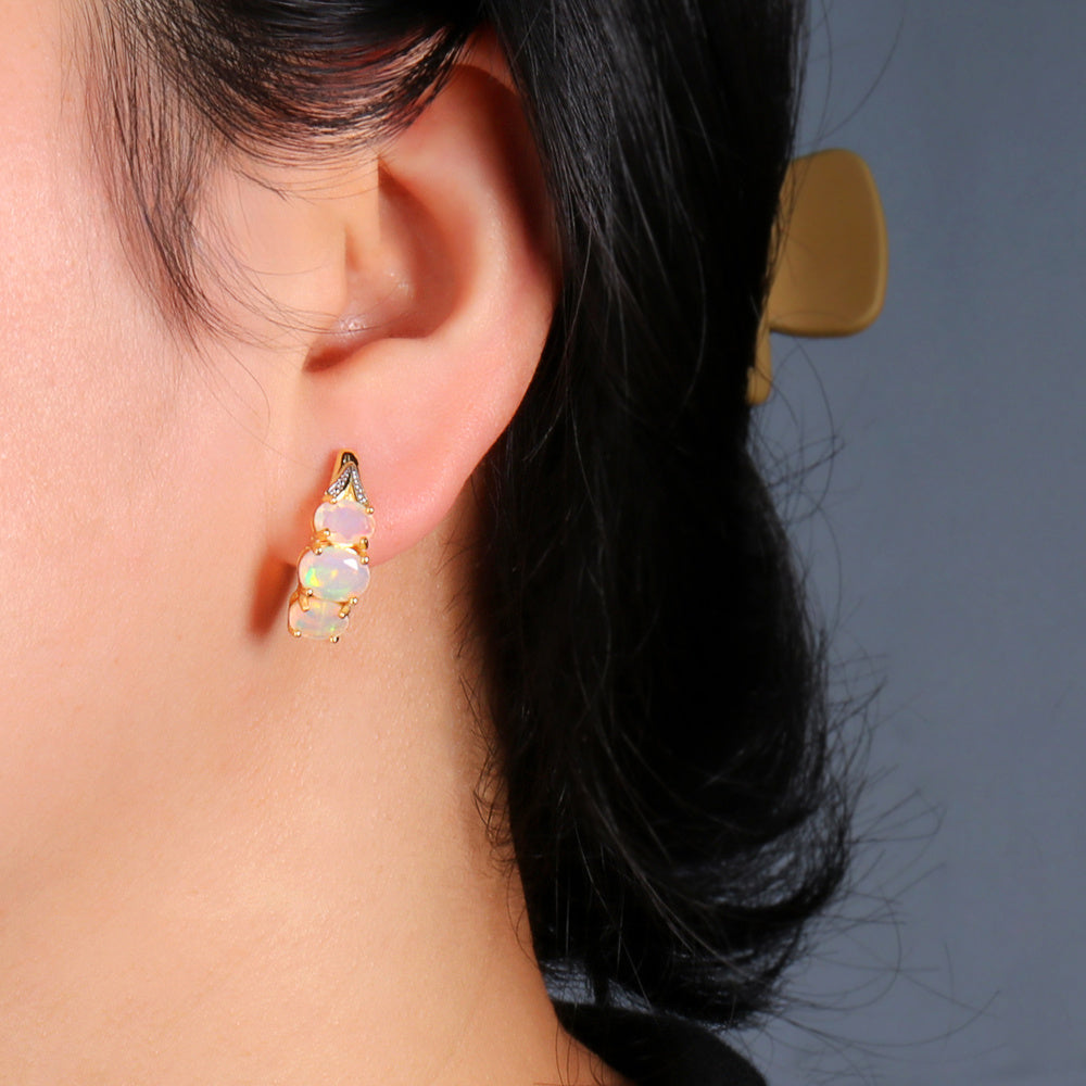 ‘Saffron’ Stacked Oval Opal Clip Earrings – on ear