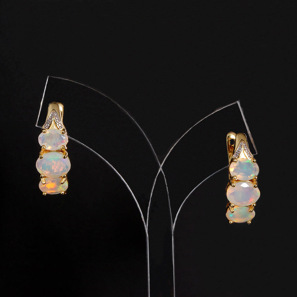 ‘Saffron’ Stacked Oval Opal Clip Earrings – on display stand
