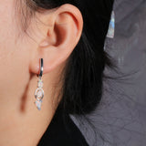 ‘Nell’ Three Opal Linear Drop Earrings – on ear