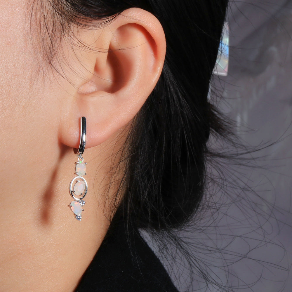 ‘Nell’ Three Opal Linear Drop Earrings – on ear