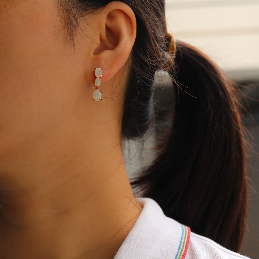 ‘Lotus’ Three Opal Ring Earring Set – on ear