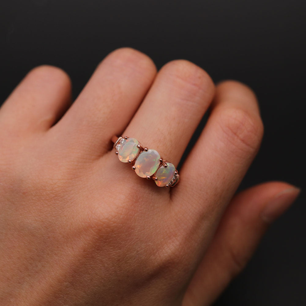 ‘Lotus’ Three Opal Ring Earring Set – ring on hand