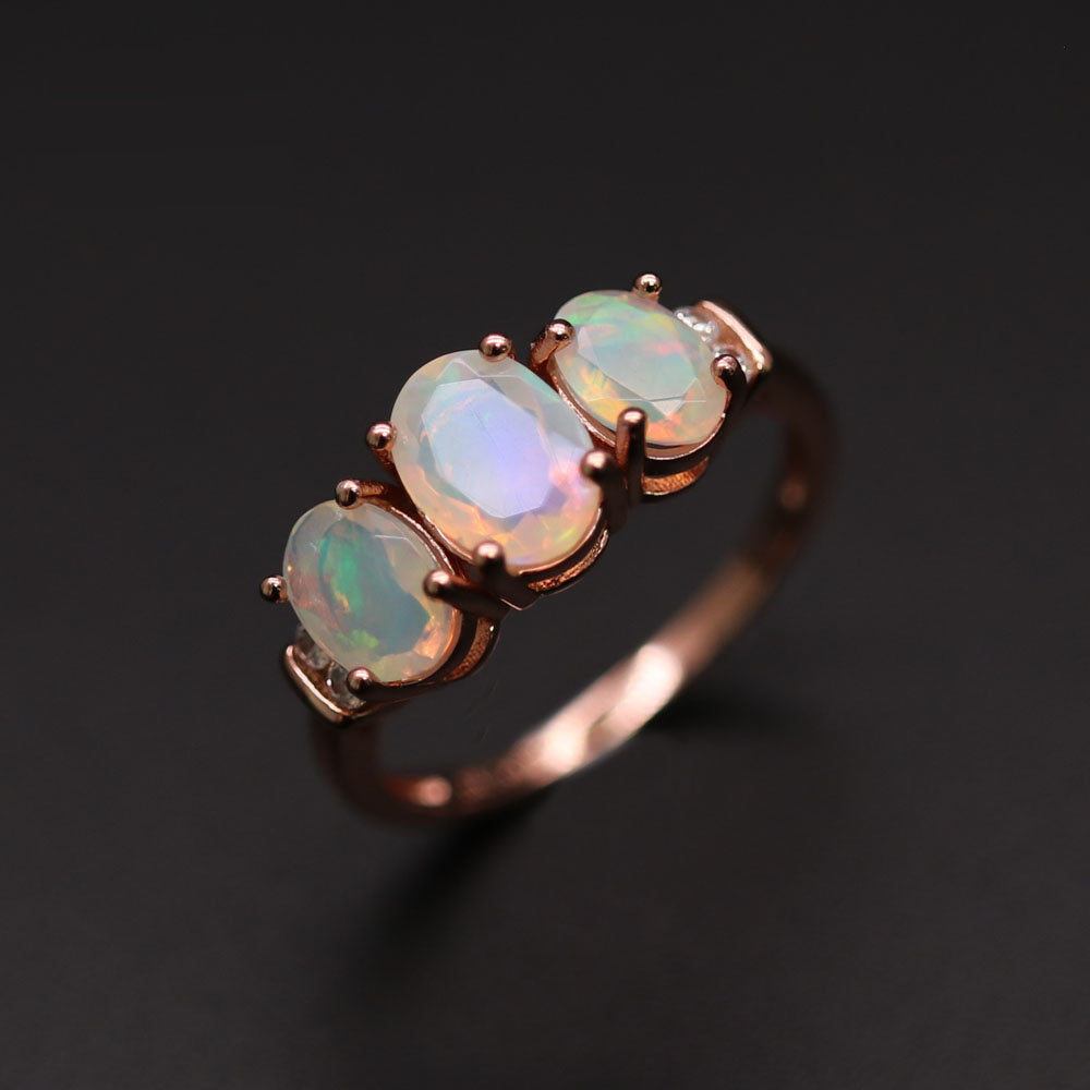 ‘Lotus’ Three Opal Ring Earring Set – ring angle