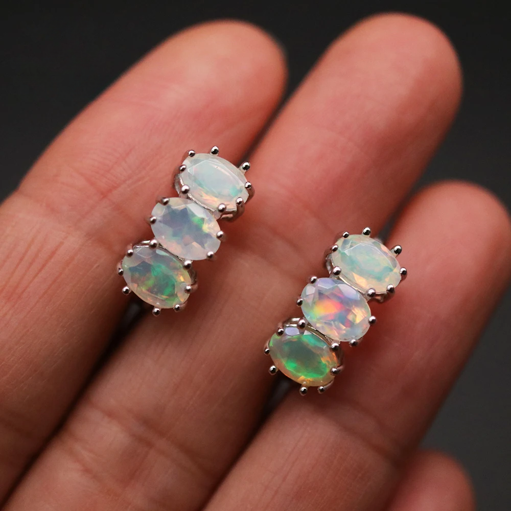 ‘Tully’ Three Oval Opal Huggie Earrings – on fingers
