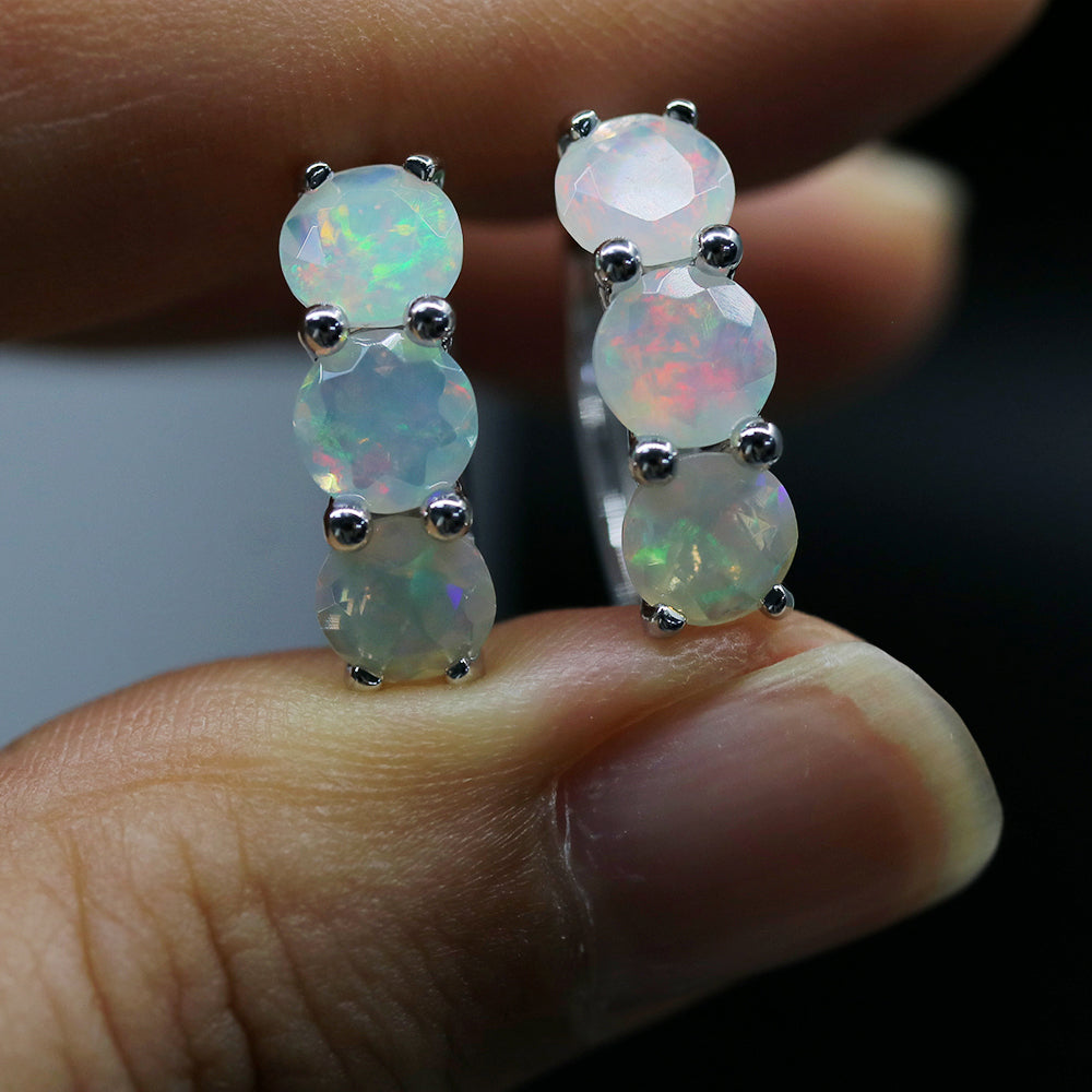 ‘Dottie’ Three Round Opal Huggie Earrings – held in fingers