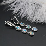 ‘Jessie’ Triple Opal Halo Drop Earrings – lying with feather