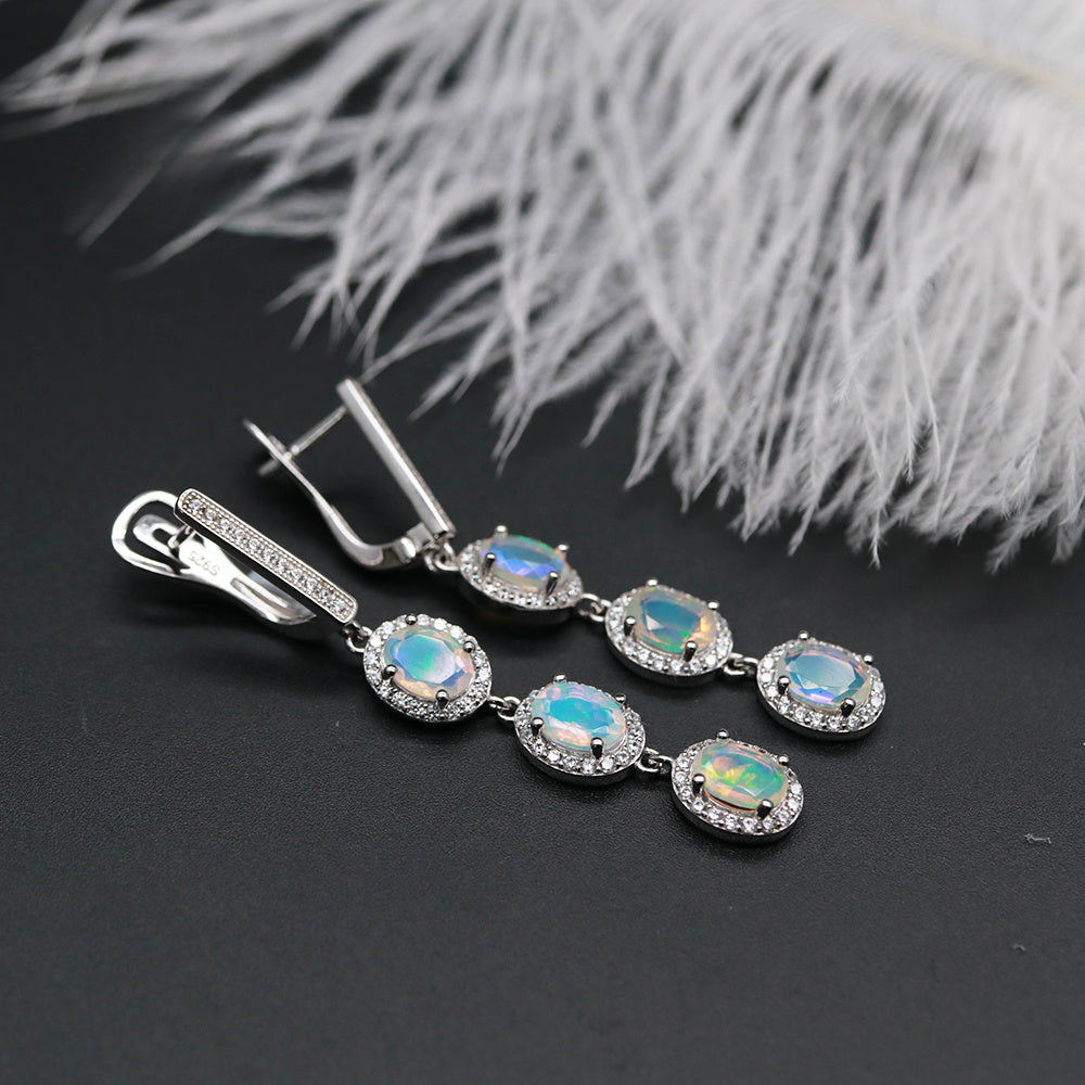 ‘Jessie’ Triple Opal Halo Drop Earrings – lying with feather